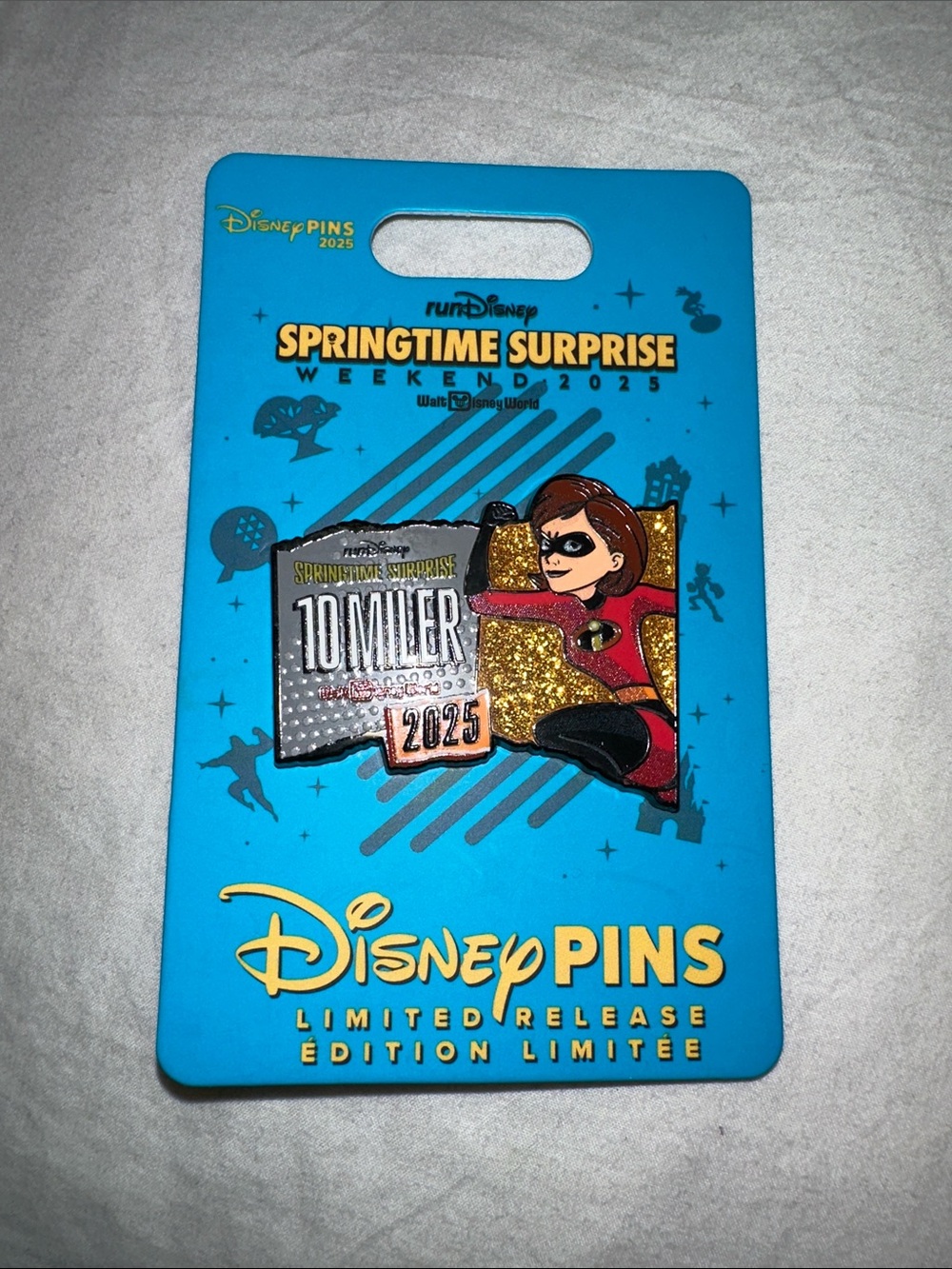 Disney Elastigirl 10 Miler 2025 Glitter Pin - Blue, Red, Gold, Black